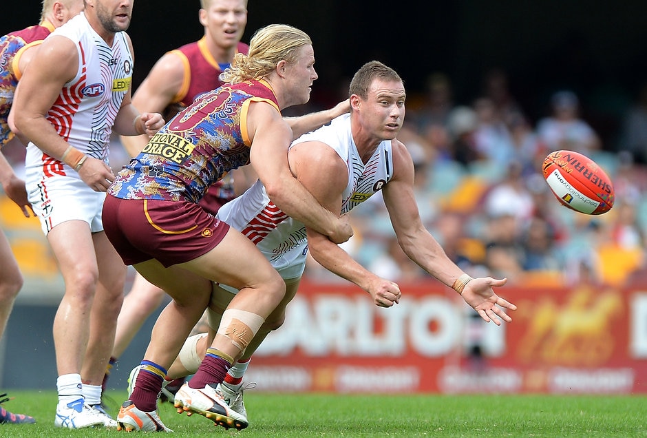 AFL 2015 Rd 09 - Brisbane v St Kilda David Armitage of the Saints gets a handball away during the 2015 AFL Round 09 match between the Brisbane Lions and the St Kilda Saints at The Gabba, Brisbane on May 31, 2015. (Photo: Bradley Kanaris/AFL Media)